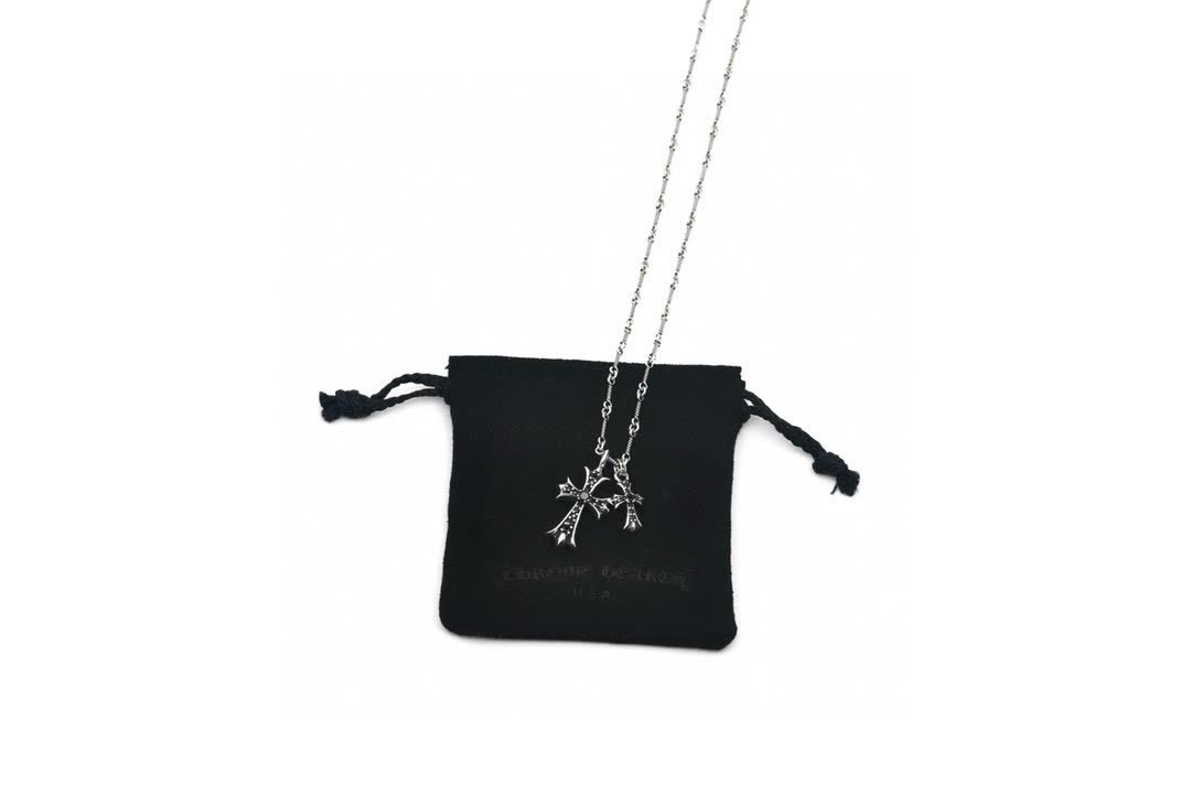 Chrome Hearts Silver Cross Pendant with Black Stones